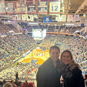 Two ladies at a basketball game