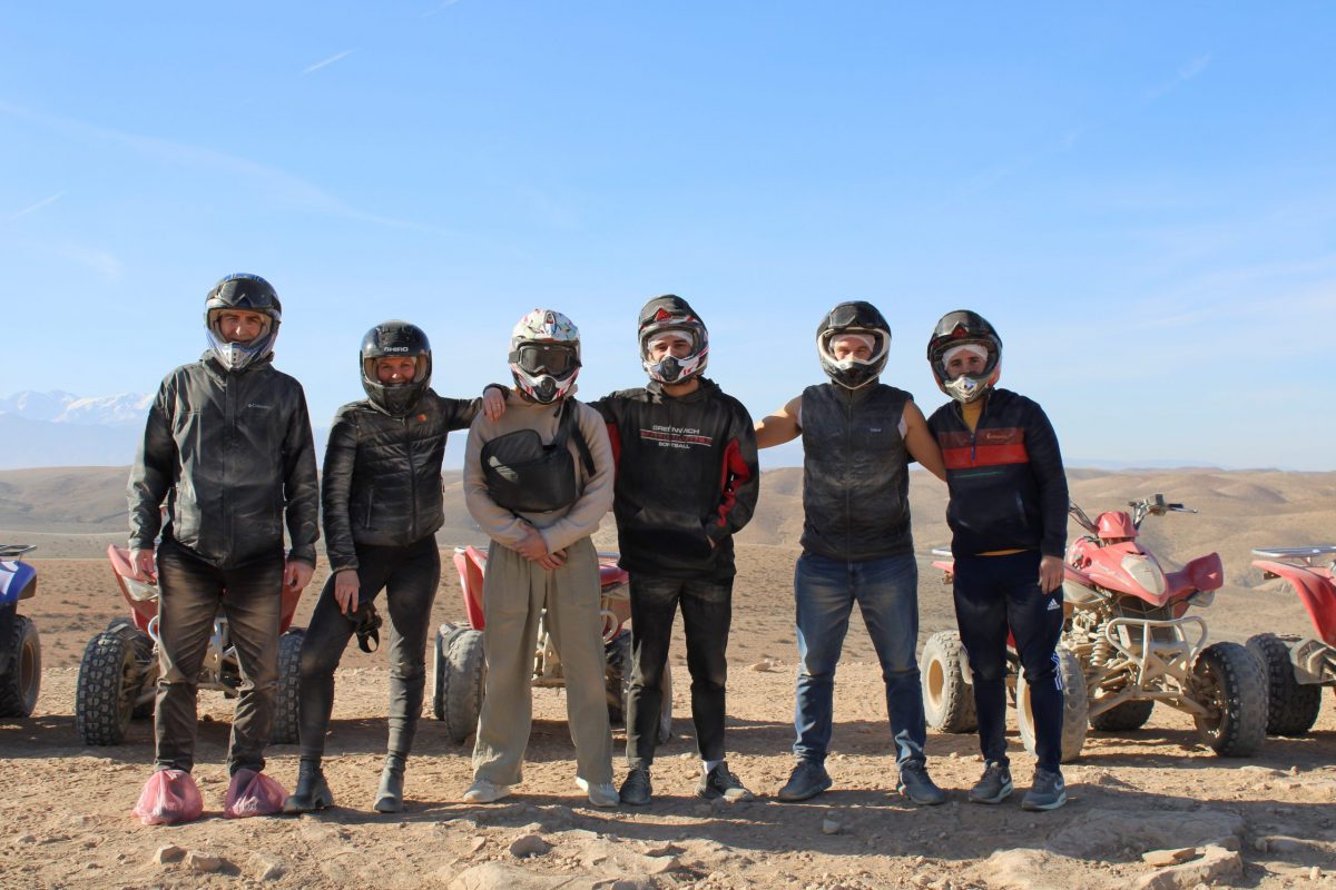 Students with ATVs in the desert in Morocco for the UConn School of Business International Trip 2025.